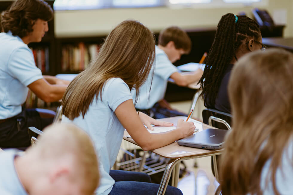 Elementary classroom at Foundation Academy taking a test