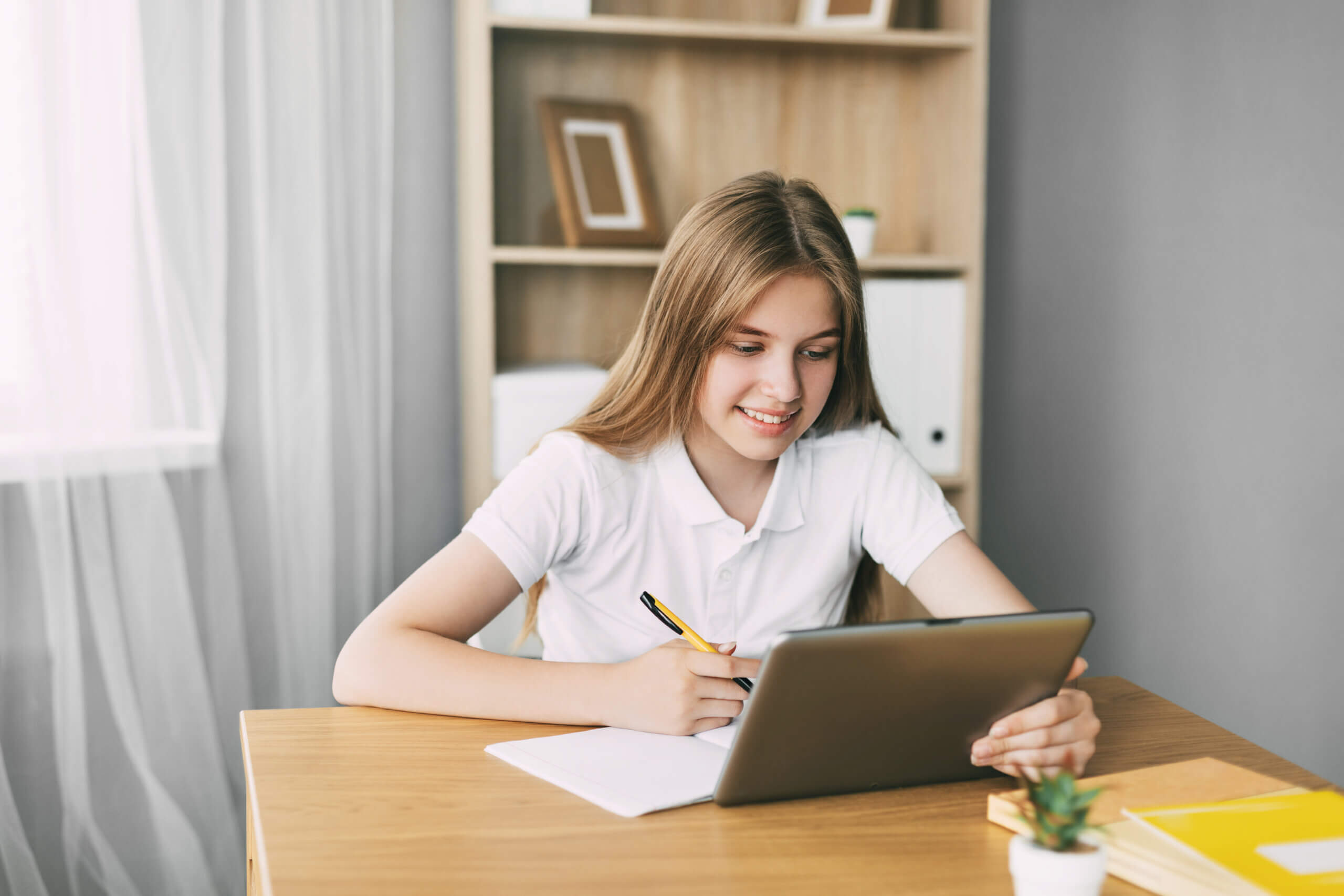 an attractive student is studying an online course QNNH28T scaled